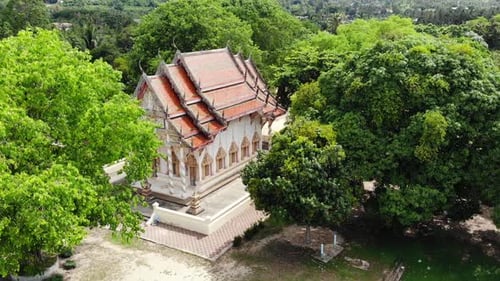 Classic Buddhist Temple Between Forest. From Above Drone View Buddhist Monastery Between Green Trees