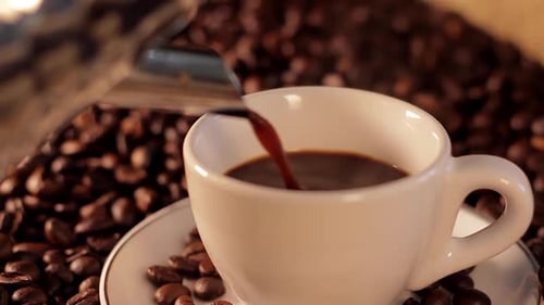 Coffee Pouring into Cup Close Up Shot