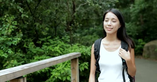 Woman walking at outdoor hiking path