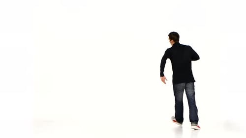 Man Dancing in a White Studio