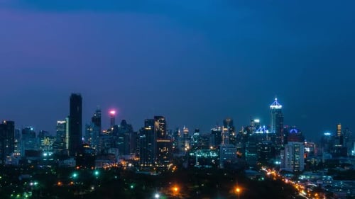 Time Lapse Night Cityscape and Highrise Buildings in Metropolis City Center