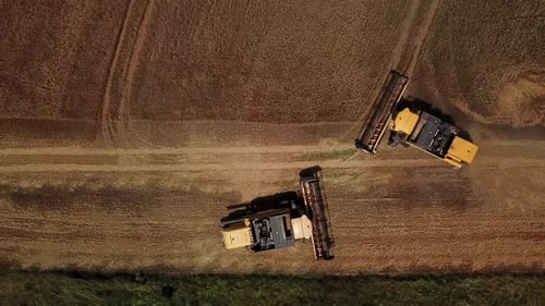 Top Down View of Combine Harvesters Agricultural Machinery. The Machine for Harvesting Grain Crops