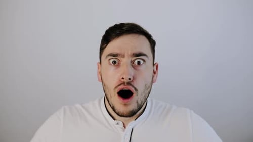Man Expresses Extreme Shock and Horror Reaction