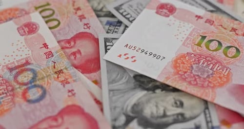 Dollars and Yuan Piled Together