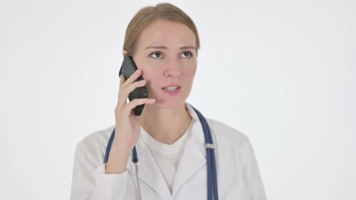 Woman Doctor in Lab Coat Talking on Phone