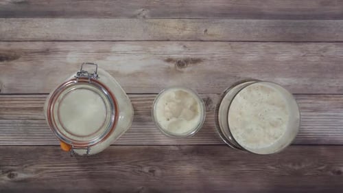 Sourdough Starter Displayed in Glass Jars