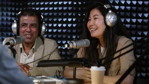 Happy Man and Woman Chatting with Radio Host