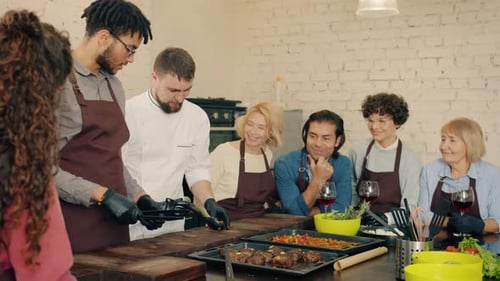Chef Prepares Steak Meal During Cooking Class