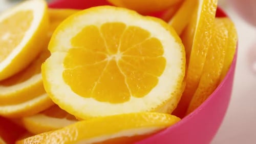 Bright Orange Slices in a Bowl