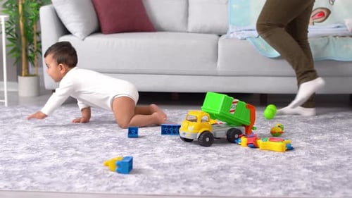 Crawling baby and mother.