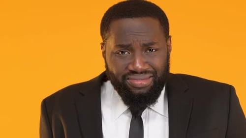 Confused Man Scratching His Head Close Up