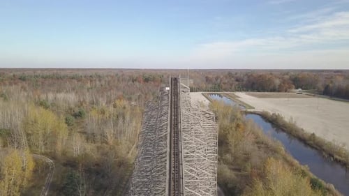 Aerial along top of rollercoaster at closed amusement park in Michigan
