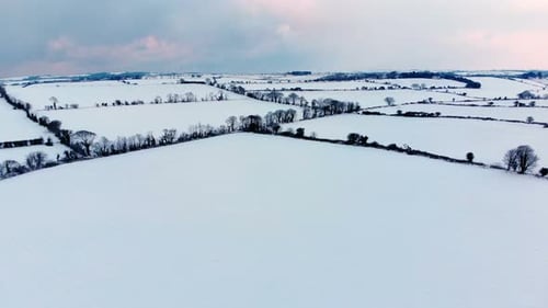 Aerial View of Snow Covered Rural Landscape