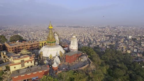 Flying over Swayambhunath Stupa as Black Kites fly