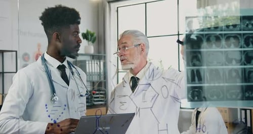 Professor of Medical University Talking to His Confident African American Student in Clinic Lab