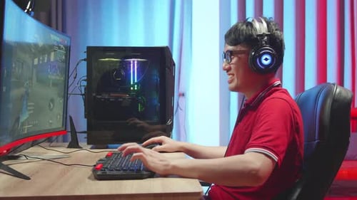 Man Playing a Video Game at Home