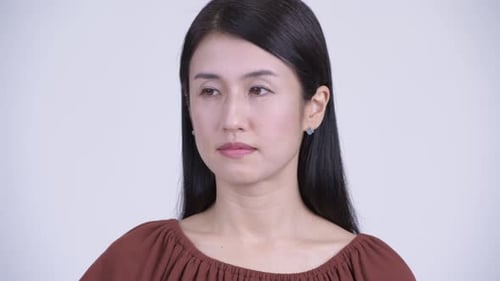 Portrait of Elegant Woman Looking at Camera