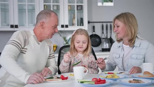 Family Mealtime in Bright Kitchen