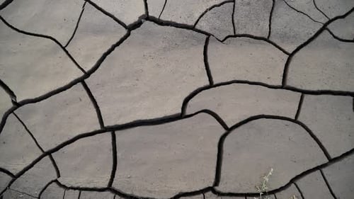 Dry Cracked Soil in an Arid Landscape