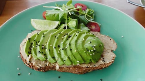 Avocado Toast with Salad and Lime for Breakfast