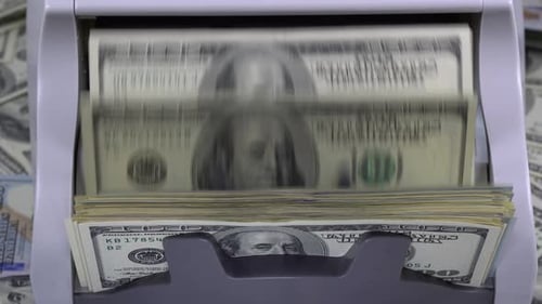 Money Counter Processing Stacks of Currency Quickly