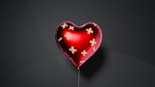 Animated Mended Red Heart Balloon with Adhesive Bandages