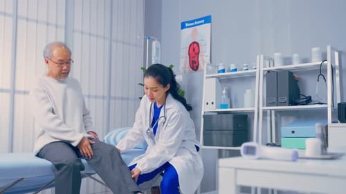 Doctor Examining Patient's Leg in Clinic