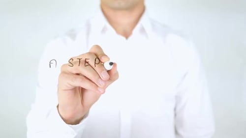 Hand Writes "A Step in the Wrong Direction"