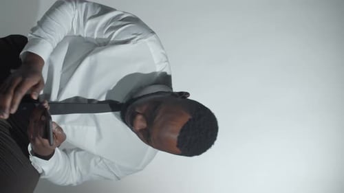 Close up of Male on Cellphone