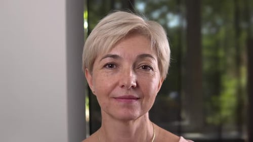 Close Up of Blond Woman with Kind Expression