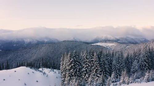 Beautiful Cinematic Winter season Landscape of Snowy mountain. Aerial view