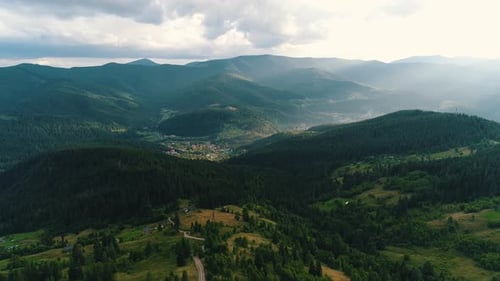 Village in the Valley of Mountains
