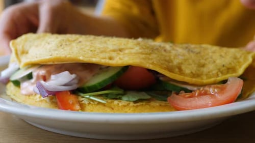 Close Up of Chickpea Omelette Stuffed with Vegetables
