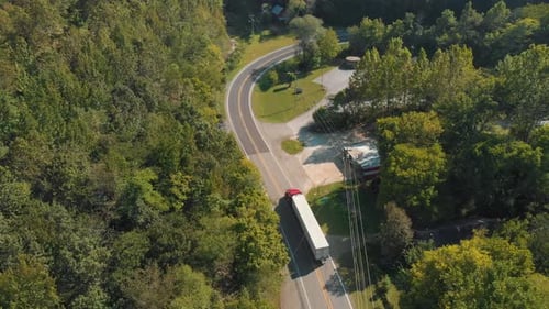 Semi Truck Driving On Curvy Country Road