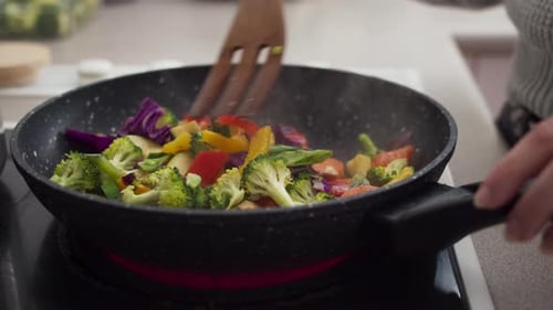 Stir-Fry Vegetables Simmering in Pan