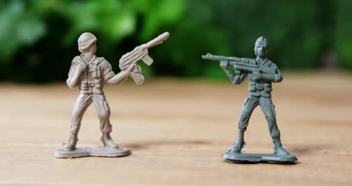 Soldiers with rifle fighting