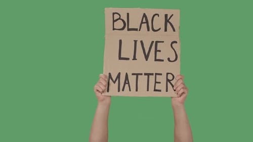 Arms Holding Black Lives Matter Sign on Green Screen