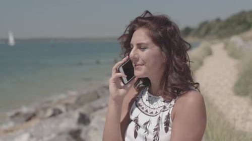 Close Up Shot Of Young Attractive Woman Receiving Call From A Friend - Ungraded