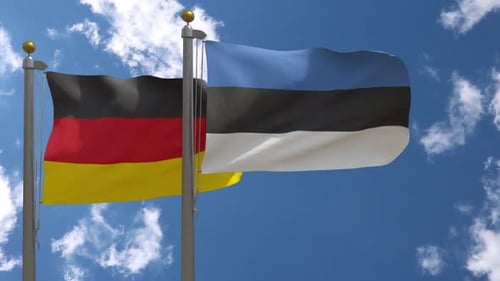 Germany and Estonia Flags Waving on Flagpoles