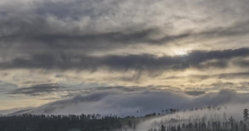 Mountains and Cloudscape at Sunrise