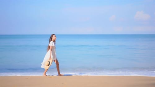 Asian woman enjoy around beautiful beach sea ocean