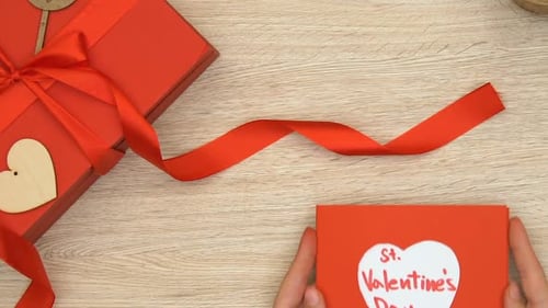 Lady Holding St Valentines Day Greeting Card, Giftbox on Table, Romantic Present