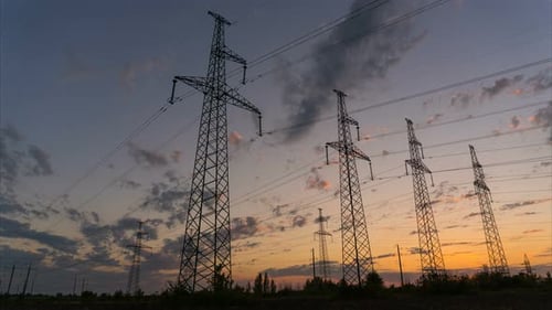 Electricity Pylons at Golden Sunset Time-Lapse