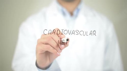 Doctor Writes Cardiovascular Health on Clear Surface