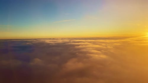 Golden Clouds at Sunrise Aerial View