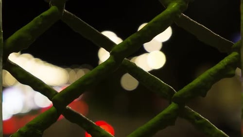 View Through The Bars At The Moving City Lights, Time Lapse