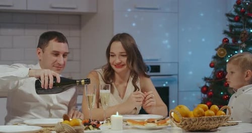Festive Family Celebrates Christmas at Home