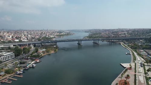 Aerial View Of City With Bridge Over River