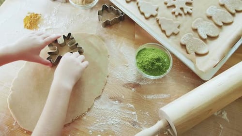 Child Baking Cookies for the Holidays