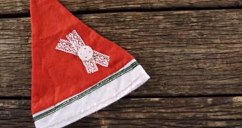 Festive Santa Hat on a Rustic Wood Table